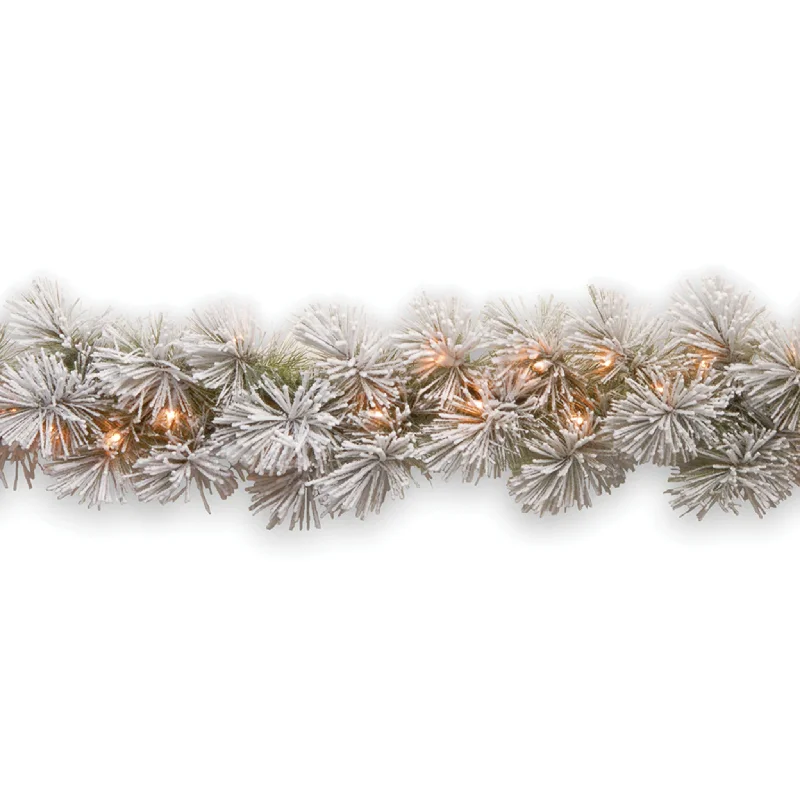 9 ft. Pre-Lit Snowy Bristle Pine Garland with Clear Lights