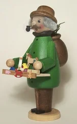 Toy Trader in Green Coat Smoker by Kuhnert GmbH